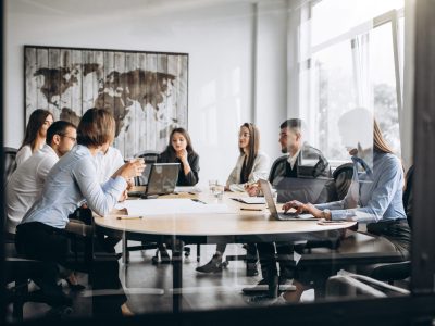 Group of people working out business plan in an office